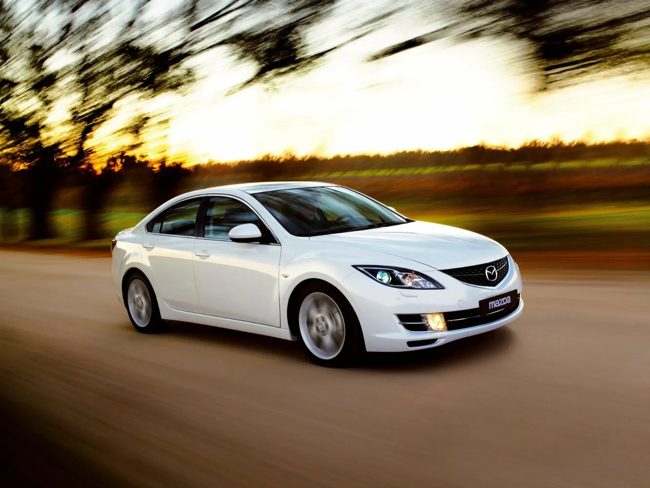Фото автомобиля Mazda 6 II (GH) 3.7 MT (273 Л.с.) — заводские размеры шин, ширина дисков, вылет ET и давление в колесах