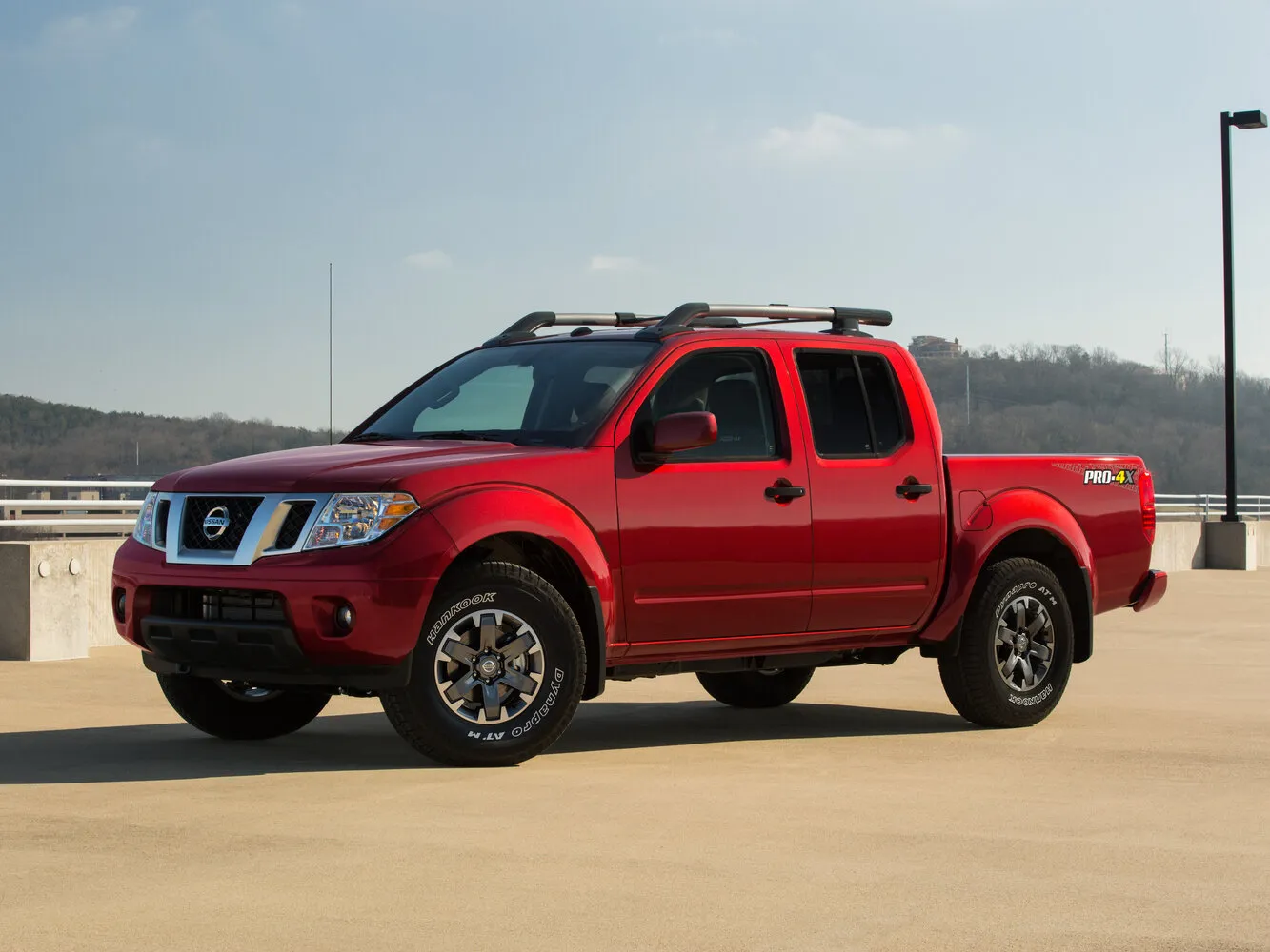 Фото автомобиля Nissan Frontier II Рестайлинг (2009–2021) 4.0 MT (261 л.с.) 4WD pickup two — параметры разболтовки, сверловка дисков, DIA и крепеж