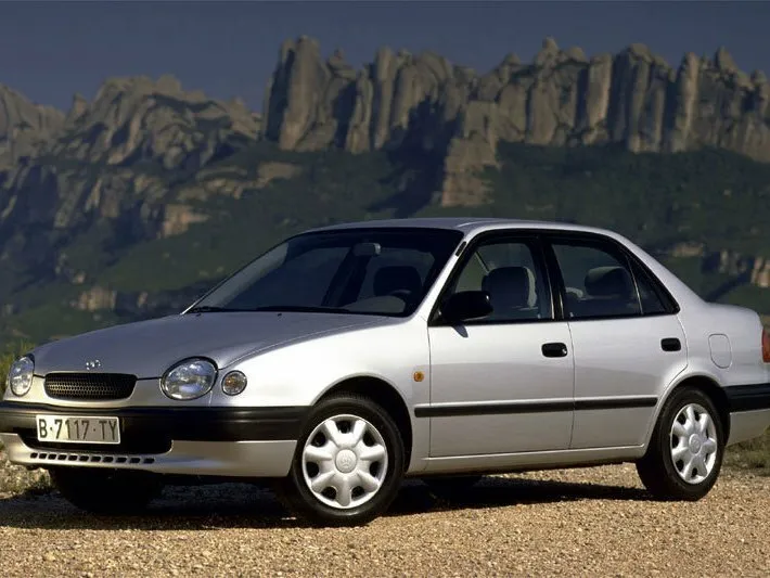 Фото автомобиля Toyota Corolla VIII (E110) 2.0d MT (73 Л.с.) — параметры разболтовки, сверловка дисков, DIA и крепеж